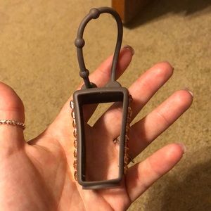 Hand sanitizer holder